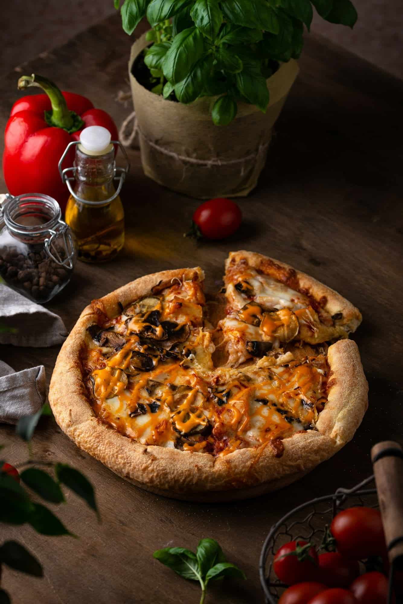 Marina Paty Accueil Palamos traditional italian pizza with cheese and mushrooms Palamós